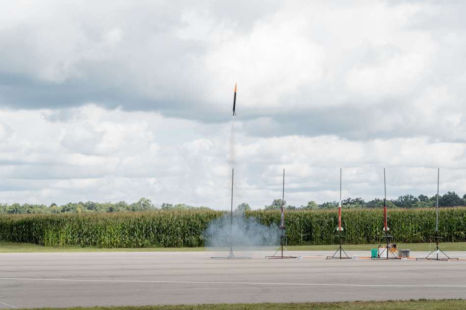 A student rocket leaving the pad